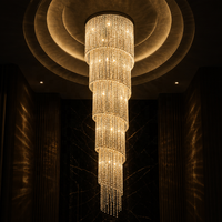 Lustre en cristal en spirale longue de luxe moderne Senfey pour hall à double hauteur, hall d'hôtel, éclairage de projet