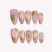 Ongles à presser en acrylique doré avec motif floral en relief, forme amande, style French Manucure, logo personnalisable, multi-usages pour fêtes et usage quotidien