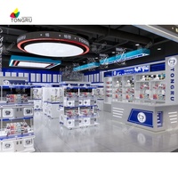 Game Shop 160 ㎡   Machine à grue à monnayeur Blue Claw en gros, conception personnalisée, pour magasin de cadeaux, parc à thème, jeu d'arcade, garantie 1 an