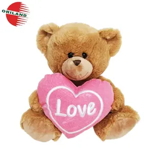 情人节泰迪熊毛绒动物浅棕色熊毛绒玩具与粉红色的心