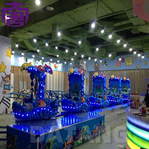 Luces LED RGB IP66 para parques infantiles y uso en paisajismo con luces azules alrededor de las cabañas - Product Image 1