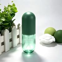 Flacon pulvérisateur en plastique PET de 60 ml en forme de capsule, tête de pulvérisation fine mate sérigraphiée pour cosmétiques, soins capillaires, nettoyant visage