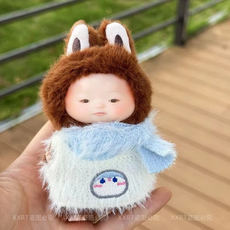 Conjunto de dos piezas: bufanda y gorro de pingüino blanco.