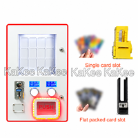 Distributeur automatique de cartes à collectionner avec fente pour pièces et deux boutons pour la distribution automatique de paquets de cartes MTG