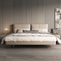 Lit double king size moderne et minimaliste en cuir véritable avec cadre en métal haut de gamme et rembourrage luxueux pour chambre principale