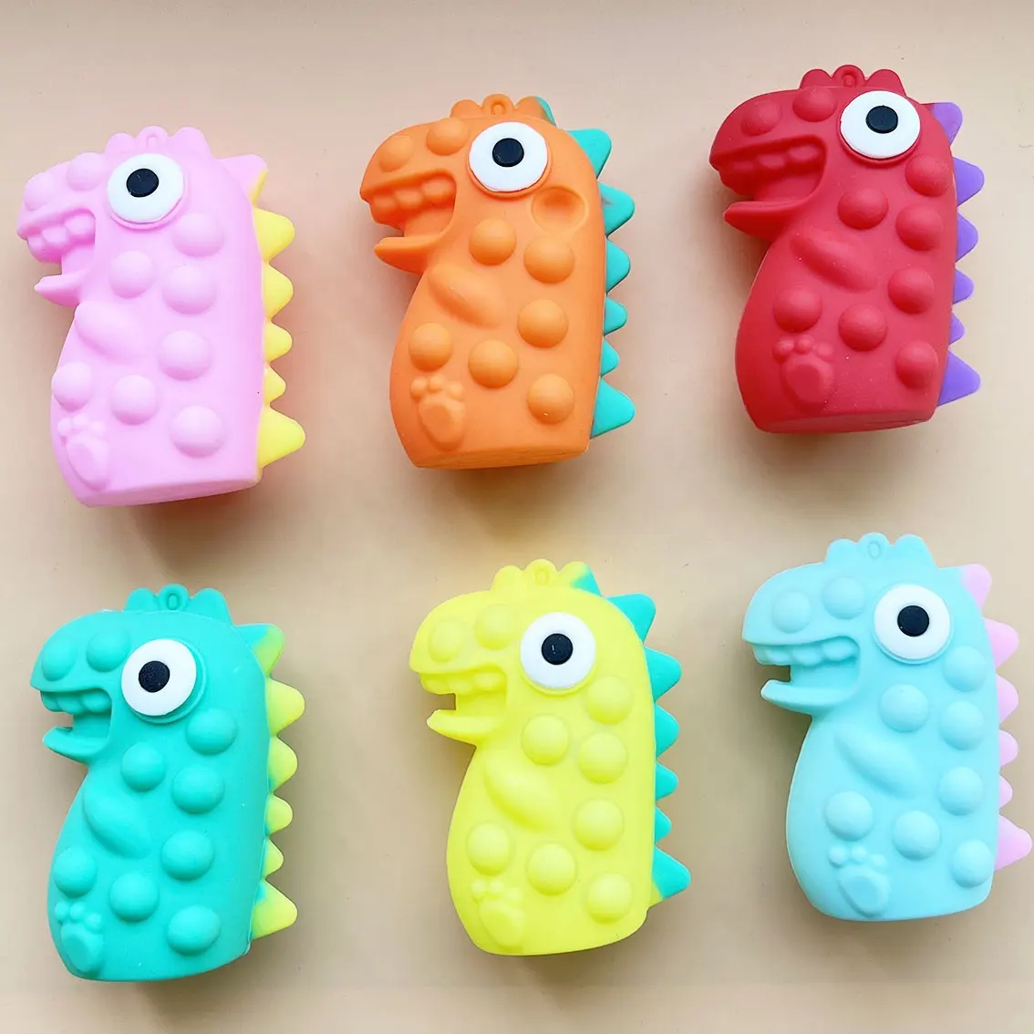 3D-Fidget-Spielzeug Dinosaurier-Schub-Blasen Fidget-Spielzeug Sinnes-Stressabbau Puppet-Quetschen lustige Augenspielzeuge