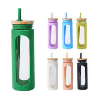 Bouteille d'eau transparente en verre à haute teneur en borosilicate avec manchon en silicone couvercle en bambou et paille