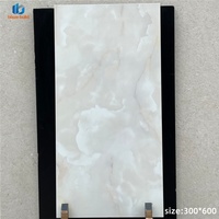 Carreaux muraux en porcelaine polie blanc Carrara de luxe 30x60, carreaux de sol émaillés pour salle de bain, villa, hôtel, projet