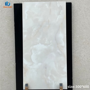Carreaux muraux en porcelaine émaillée polie blanc Carrara <span class=keywords><strong>de</strong></span> luxe 30x60 pour <span class=keywords><strong>salle</strong></span> <span class=keywords><strong>de</strong></span> <span class=keywords><strong>bain</strong></span>, carreaux muraux intérieurs - Product Image 2