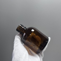 Flacon en verre ambré pour sirop contre la toux avec bouchon à vis et design sérigraphié pour le stockage de médicaments et de lotions