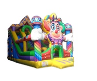Structure gonflable géante de cirque avec toboggan, château gonflable, échelle d'escalade et double piste de glisse, équipement de parc d'attractions pour carnaval