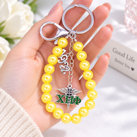 Pendentif Caducée fait main en perles jaunes avec inscription grecque EST 1932 pour la sororité Chi Eta Phi, idéal pour la confection de sacs et de porte-clés