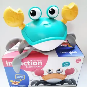 Produits tendance PT jouets lumineux crabe rampant bébé jouet avec musique et lumière LED électrique crabe rampant bébé jouet