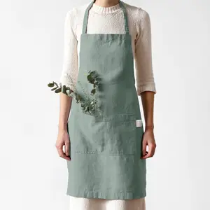 DUOLAI pabrik grosir kualitas tinggi kustom Logo Wanita taman dapur Perancis rami 100% celemek Linen dengan kantong untuk wanita