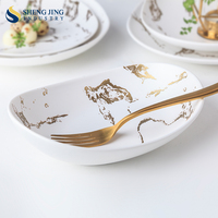 Ensemble de vaisselle de luxe de style nordique, nouveau service de table en porcelaine dorée marbrée, bols et assiettes en céramique pour hôtel