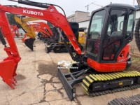 Mini-excavatrice sur chenilles d'occasion Kubota U27 2T avec moteur et système hydraulique fiables, idéale pour les chantiers étroits et les travaux d'aménagement paysager