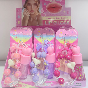 Brillo Labial con Efecto Espejo y Doble Hidratación, con Diseño de Pulsera y Colgante Adorable, para un Acabado Luminoso y Realce del Tono de Piel - Product Image 1