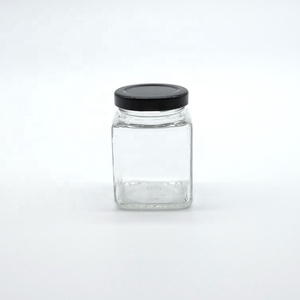 Bouteille en verre carrée pour vente en gros, idéale pour les cornichons au miel et au piment, ou comme pot vide scellé avec couvercle, résistant aux hautes températures, pour la sauce au bœuf à quatre nervures. - Product Image 6