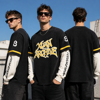 Sweat-shirt col rond noir en coton pour homme, style colorblock, manches double couche, imprimé graphique lettres, vente en gros