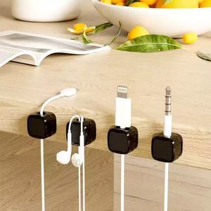 Soporte <span class=keywords><strong>de</strong></span> cable <span class=keywords><strong>de</strong></span> escritorio <span class=keywords><strong>de</strong></span> plástico <span class=keywords><strong>de</strong></span> Venta caliente organizador <span class=keywords><strong>de</strong></span> cable magnético para teléfonos móviles Android <span class=keywords><strong>accesorios</strong></span> electrónicos - Product Image 1