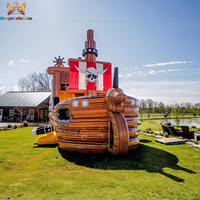 Toboggan gonflable commercial en forme de bateau pirate avec château gonflable et trampoline en PVC, facile à installer pour aire de jeux pour enfants