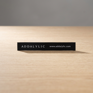 Etiquetas de Cuidado Personalizadas de Poliéster Satinado con Impresión de Serigrafía y Corte Láser, Lavables, Elegantes y de Calidad - Product Image 1