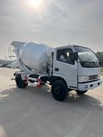 Mini-dumper sur chenilles avec moteur EURO5 EPA, commande hydraulique et poste de commande assis, pour le malaxage du béton