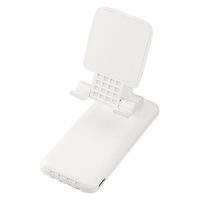 Câble intégré multifonctionnel 10000mAh banque d'alimentation de grande capacité avec support de téléphone réglable
