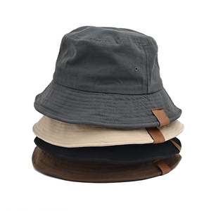 OEM diseño de su logotipo personalizado lienzo cubo sombrero al por mayor parche de cuero Unisex liso Vintage gorra de pescador - Product Image 1