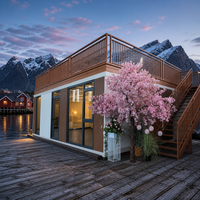 Maison conteneur modulaire préfabriquée de 30 pieds, surélevée et élargie, en panneaux sandwich d'acier pour projets de logement – Pour acheteurs et revendeurs