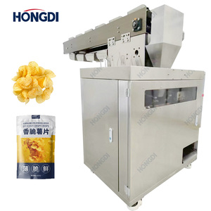 Machine d'emballage industrielle pour granulés irréguliers, solution polyvalente pour l'emballage efficace des collations et des aliments secs - Product Image 1