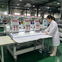 Machine à broder à deux têtes avec 12 aiguilles et une zone de broderie de 360x510 mm pour la production de vêtements