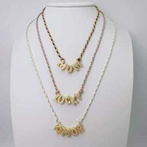 Set di Collane con Cordoncino Intrecciato all'Ingrosso, Collane con Ciondoli Lettera, Amore, Portafortuna e Ragazzo/Ragazza, in Stock - Product Image 3