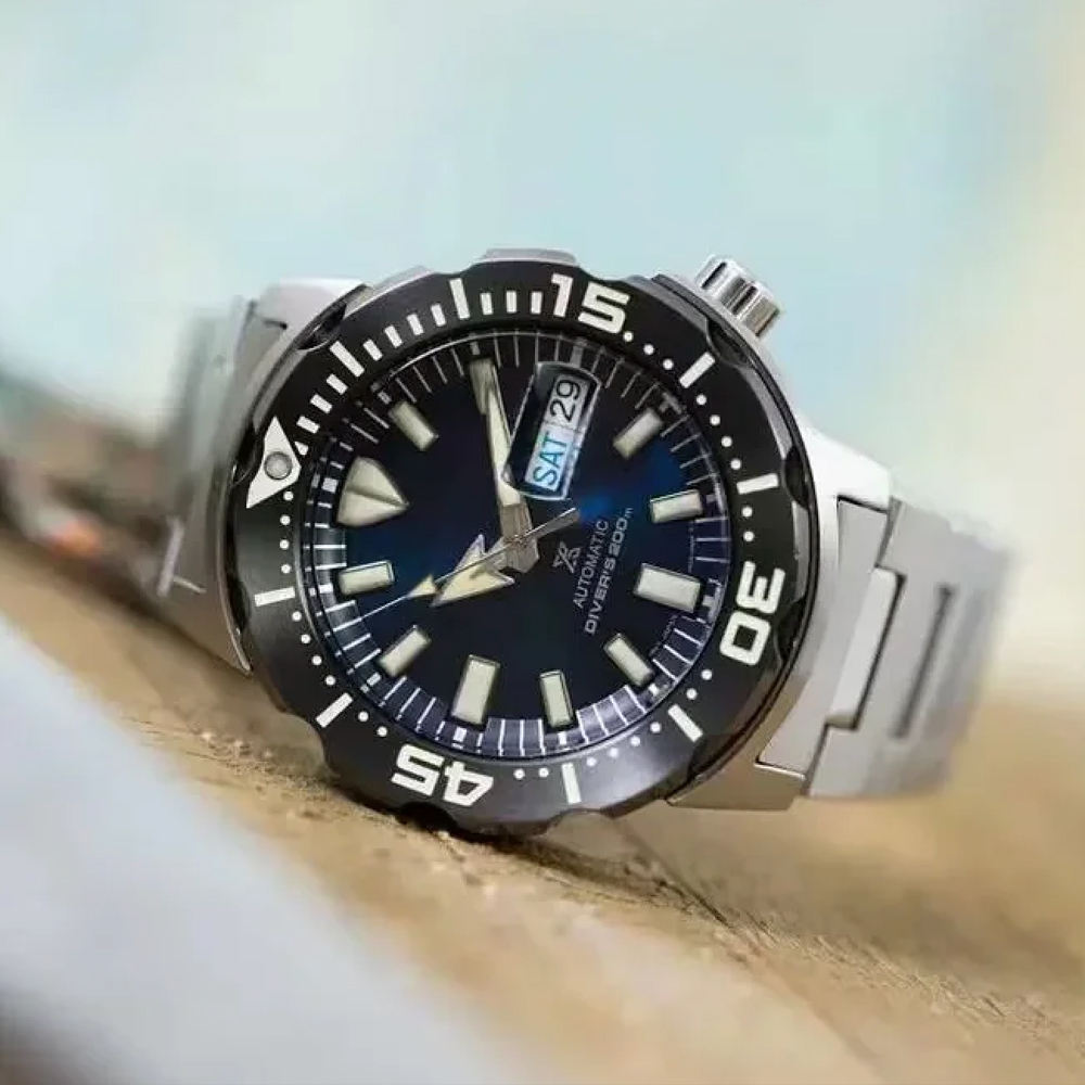 All black bezel blue dial