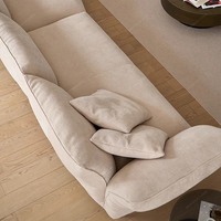 Grand canapé moderne italien en tissu pour villa d'hôtel Forme spéciale de SPARKLE Style crème minimaliste Salon en tissu à pieds hauts