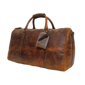 Combinando elegancia y resistencia, esta bolsa de viaje 100% de cuero genuino ofrece gran capacidad de almacenamiento y un rendimiento duradero. - Product Image 3