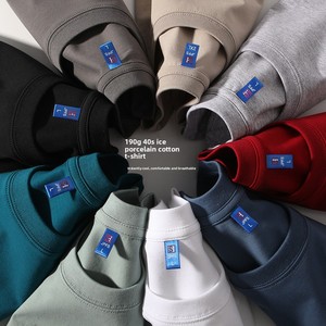 T-shirt décontracté pour homme à col rond, motif uni, en coton glacé, manches courtes, respirant, coupe ample, tricoté - Product Image 1