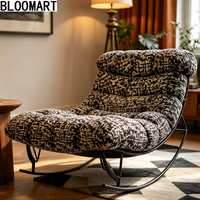 Fauteuil à bascule en cuir véritable avec rembourrage en éponge et plumes, base demi-courbe en acier inoxydable, fauteuil de relaxation