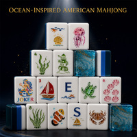 Jeu de Mahjong sur le thème nautique avec illustrations marines et dos de tuiles à motif de vagues bleues pour le divertissement entre amis