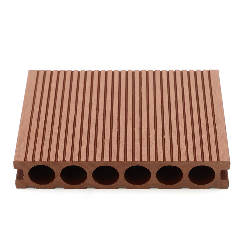 Plancher extérieur en bois composite à trous ronds