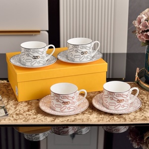 Luxury Porcelain paper clip ceramic Tea Cup & Saucer Set With box for party - Product Image 1