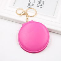 Logo personnalisé en cuir Pu miroir rond double face mini poche pliante petit miroir portable avec porte-clés