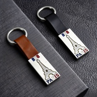 Porte-clés en cuir et alliage de zinc, finition laquée, style européen, pendentif drapeau français Paris, accessoires de sac, souvenir de voyage créatif