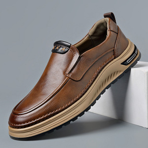 รองเท้าโลฟเฟอร์แบบสวมสำหรับผู้ชาย หนังสีน้ำตาล ส้นเตี้ย รองเท้าลำลอง สีพื้น ดีไซน์ลายเย็บด้าย สวมใส่สบาย เหมาะสำหรับวัยรุ่น - Product Image 1