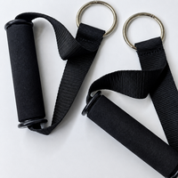 Poignées d'attache pour câbles de gym avec poignées en ABS noir, sangles en nylon et anneaux en D métalliques pour l'entraînement musculaire