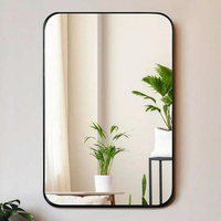 Miroir rectangulaire moderne argenté avec coins arrondis, éclairage LED réglable, usage commercial, couleur personnalisable