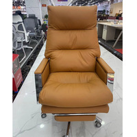 Chaise de bureau moderne confortable en cuir PU, personnalisable ODM/OEM, pivotante et inclinable avec repose-pieds, idéale pour le travail sur ordinateur