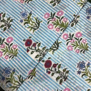 Tela de Algodón Ligera y Transpirable con Estampado Floral Multicolor en Azul Cielo, Hecha a Mano - Product Image 1