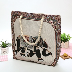 Bolso de mano informal de artesanía tailandesa para mujer, diseño de elefante bordado sobre lienzo, ecológico para uso escolar de otoño e invierno para estudiantes - Product Image 1