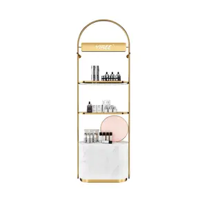 कस्टम लोगो मेकअप ब्रांड की दुकान खड़ी शेल्फ घुड़सवार डिजाइन स्वर्ण धातु सौंदर्य प्रसाधन प्रदर्शन कैबिनेट शोकेस